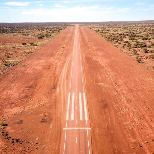 Drone,Photo,Of,A,Straight,Australian,Highway,With,And,Emergency